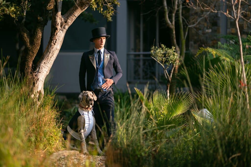 man standing with dog at hotel in sandton