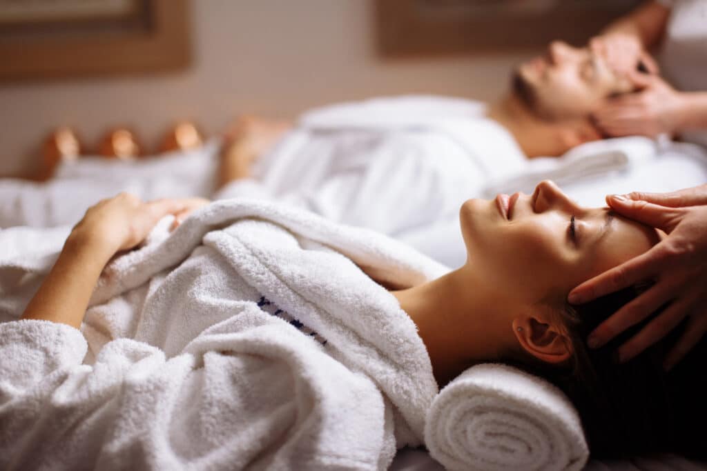 couple in a luxury spa getting a couples massage 